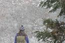 student walking in the snow