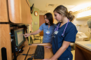 Nurse and nursing student at Portsmouth Regional Hospital